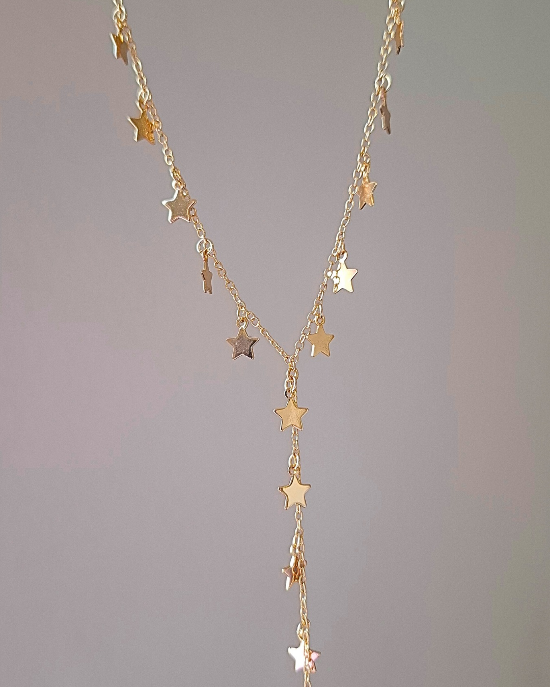 COLAR GRAVATA ESTRELAS