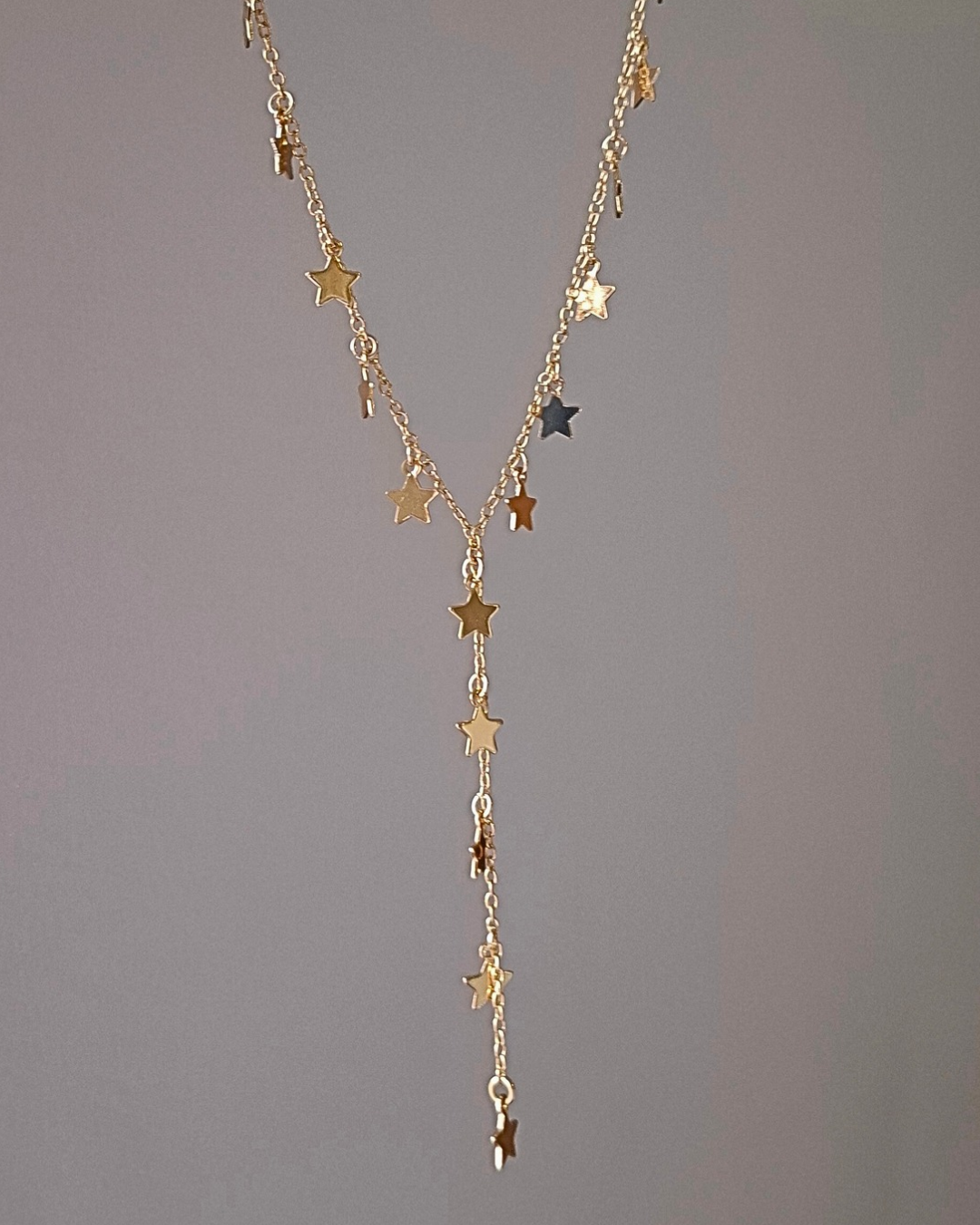 COLAR GRAVATA ESTRELAS