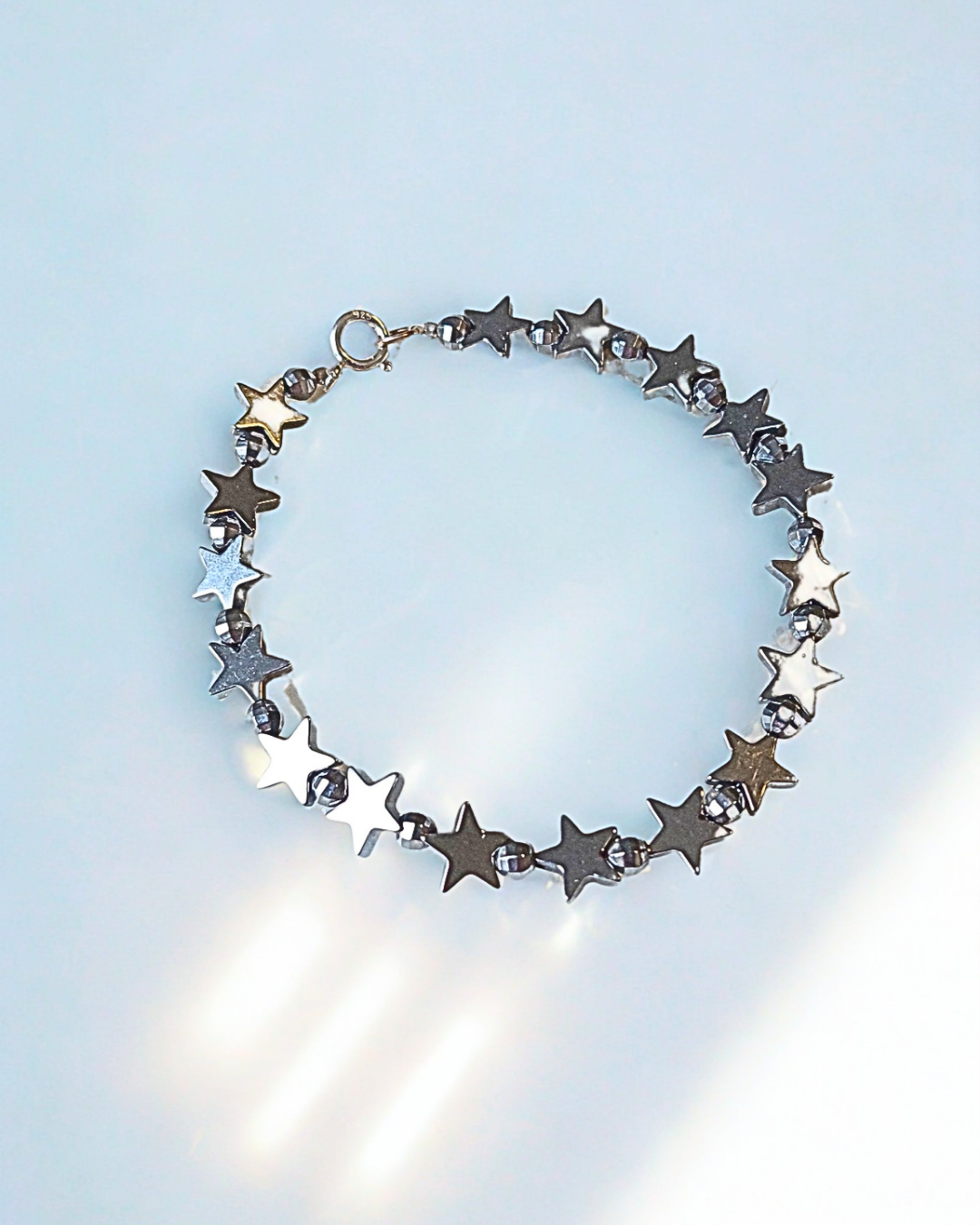 PULSEIRA DE HEMATITAS PRATEADAS