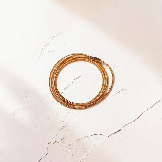PULSEIRA CORDA DE VIOLÃO OURO